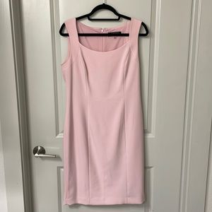 Light pink fitted dress. Size 8. Length is past the knees.